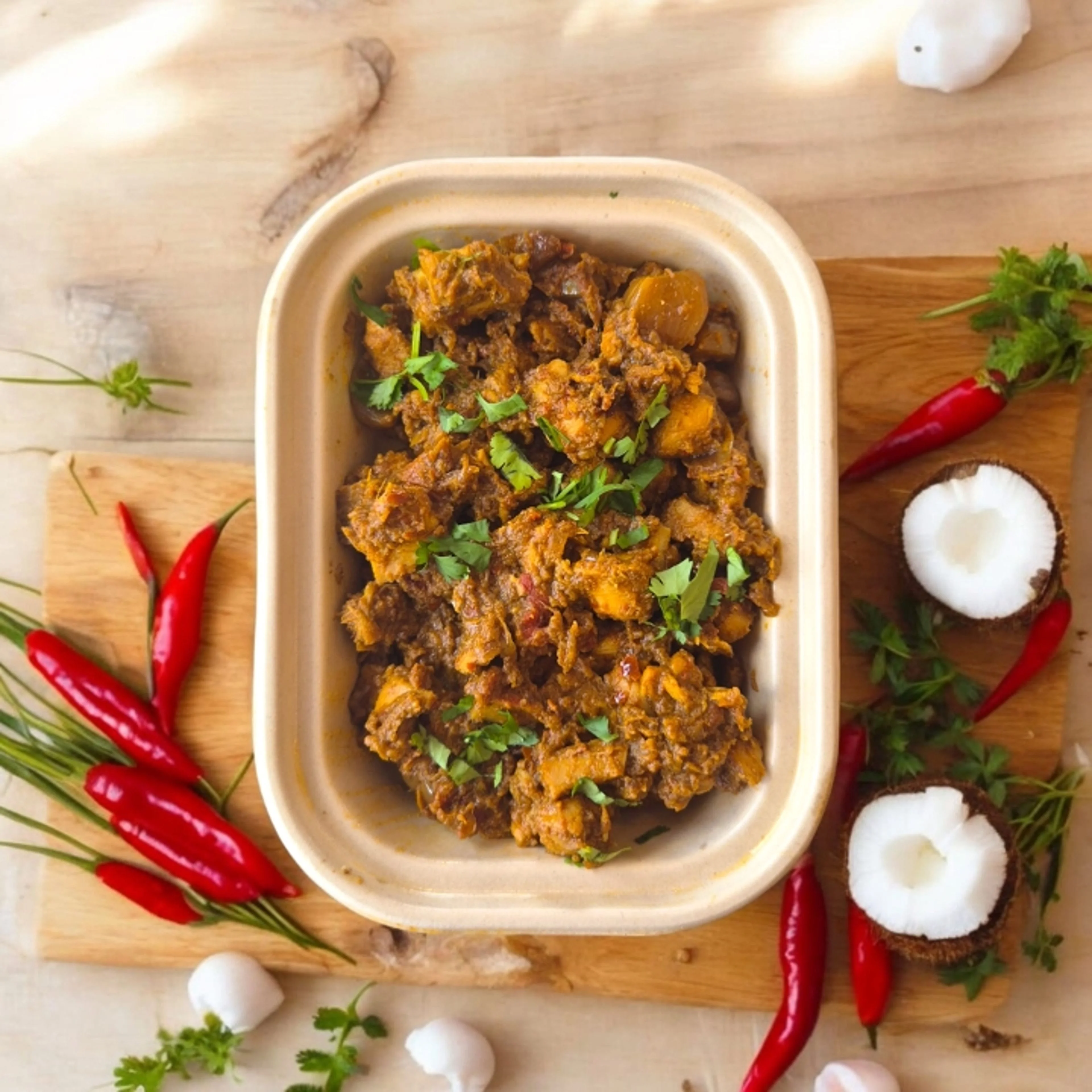 Nigerian goat meat pepper soup with herbs