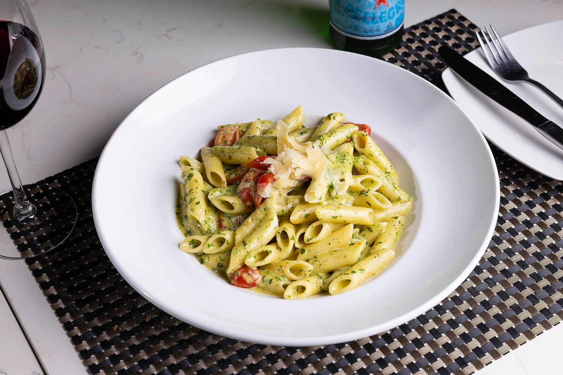 Cucina pesto pasta paired with red wine