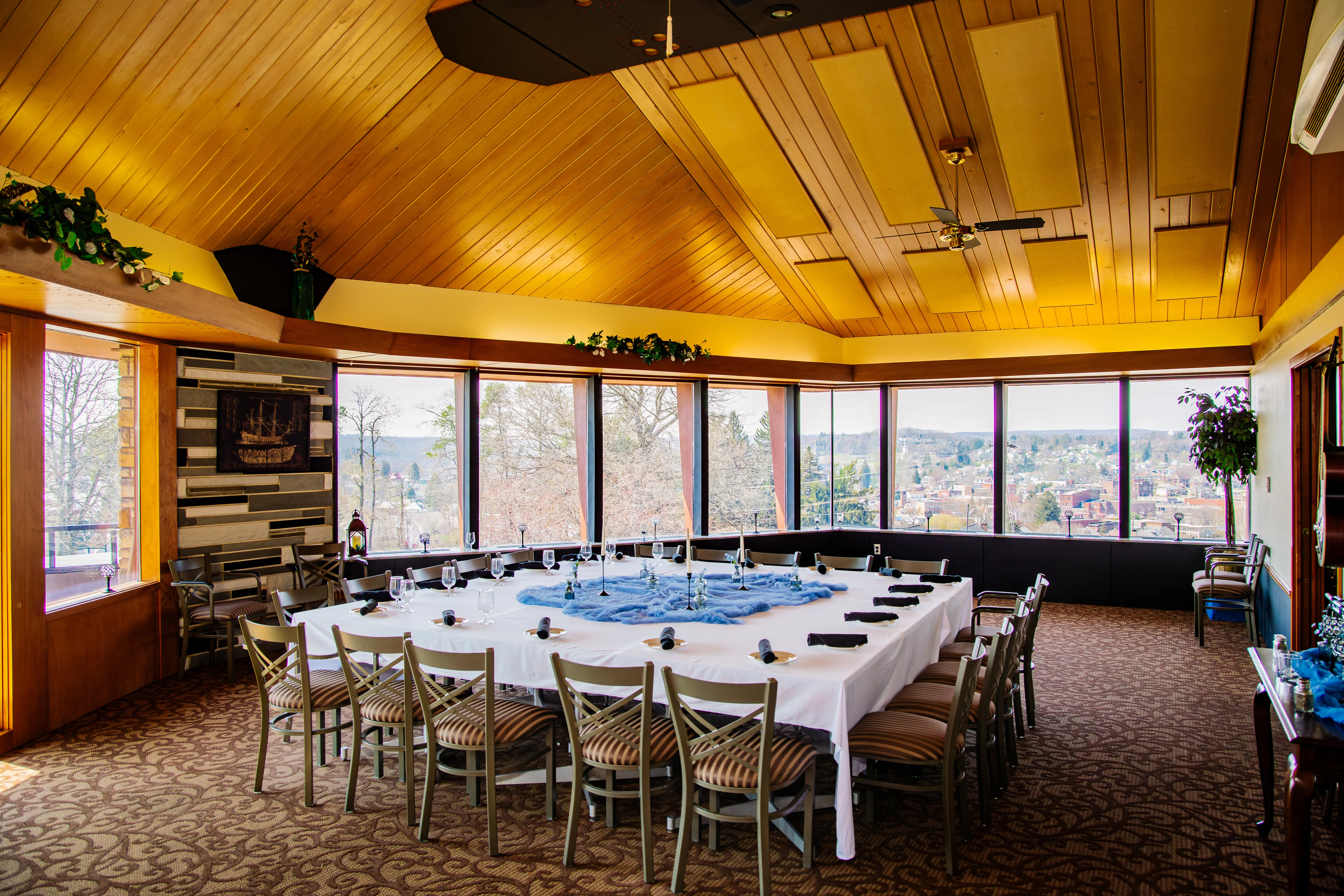 Elegant dining room with panoramic views and a large table setup