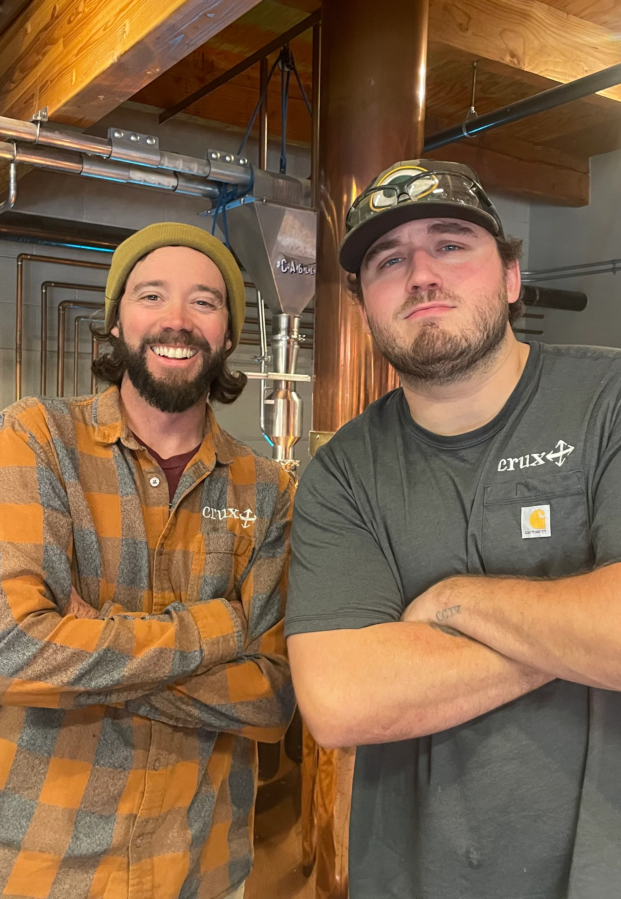 Crux brewers smiling in brewhouse