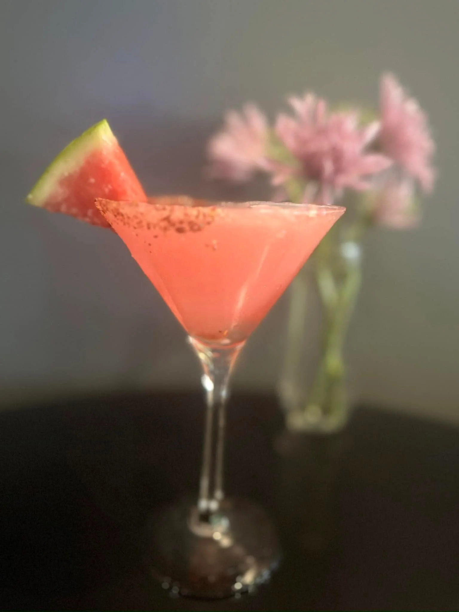 Refreshing watermelon cocktail garnished with a slice