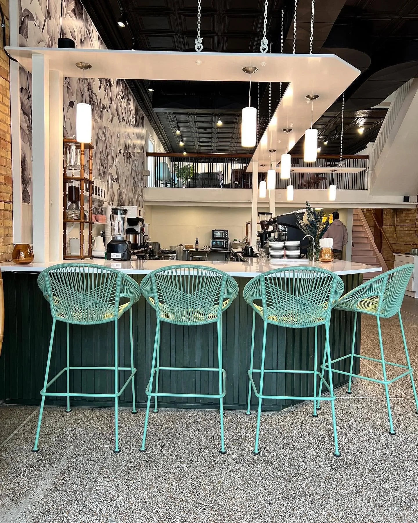 Modern bar counter with stylish seating and elegant decor