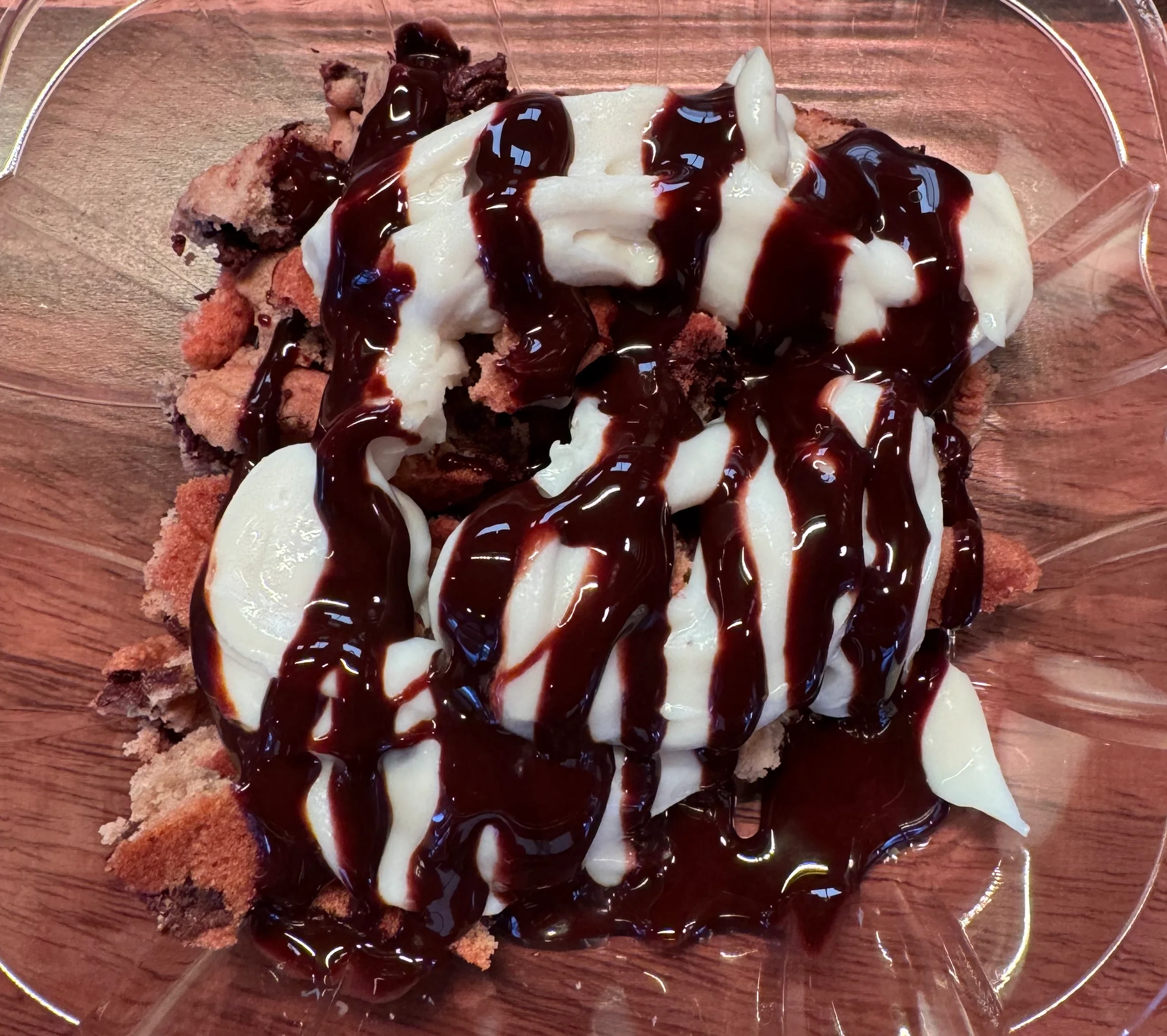 Decadent dessert bowl featuring popcorn and chocolate drizzle