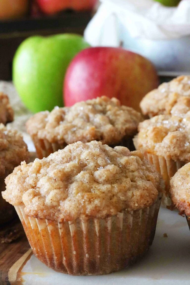 Freshly baked apple muffins with crumb topping