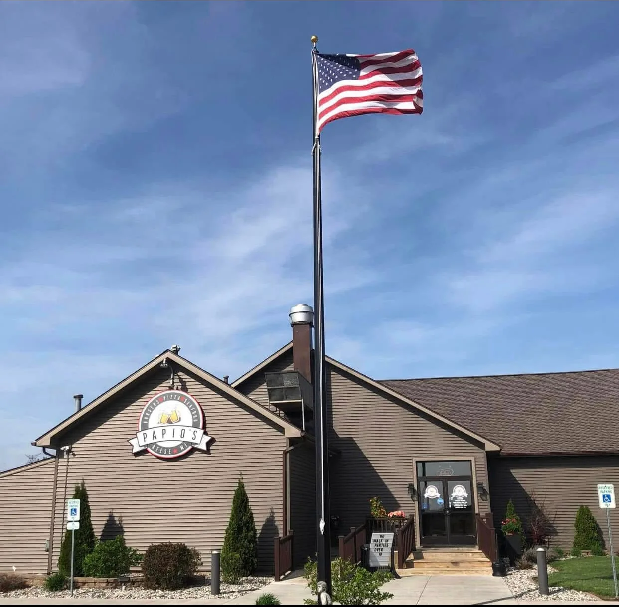 Exterior view of Papios restaurant with American flag