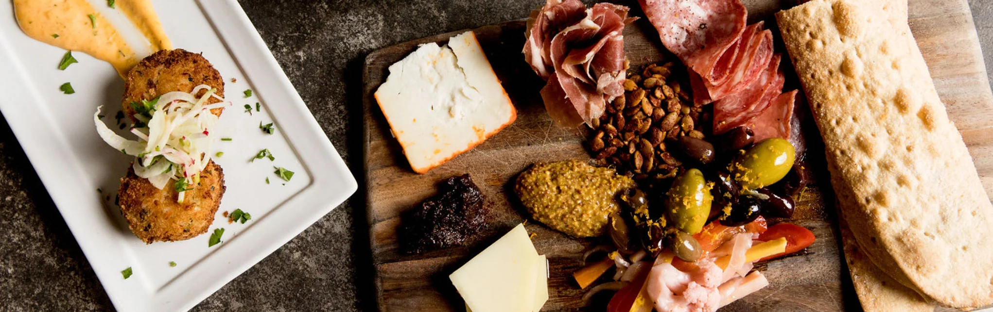 Charcuterie board with assorted meats and cheeses