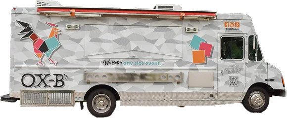 Colorful food truck parked at a vibrant outdoor location.