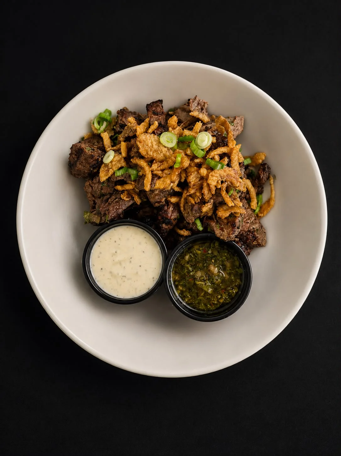 Crispy beef stir-fry with dipping sauces