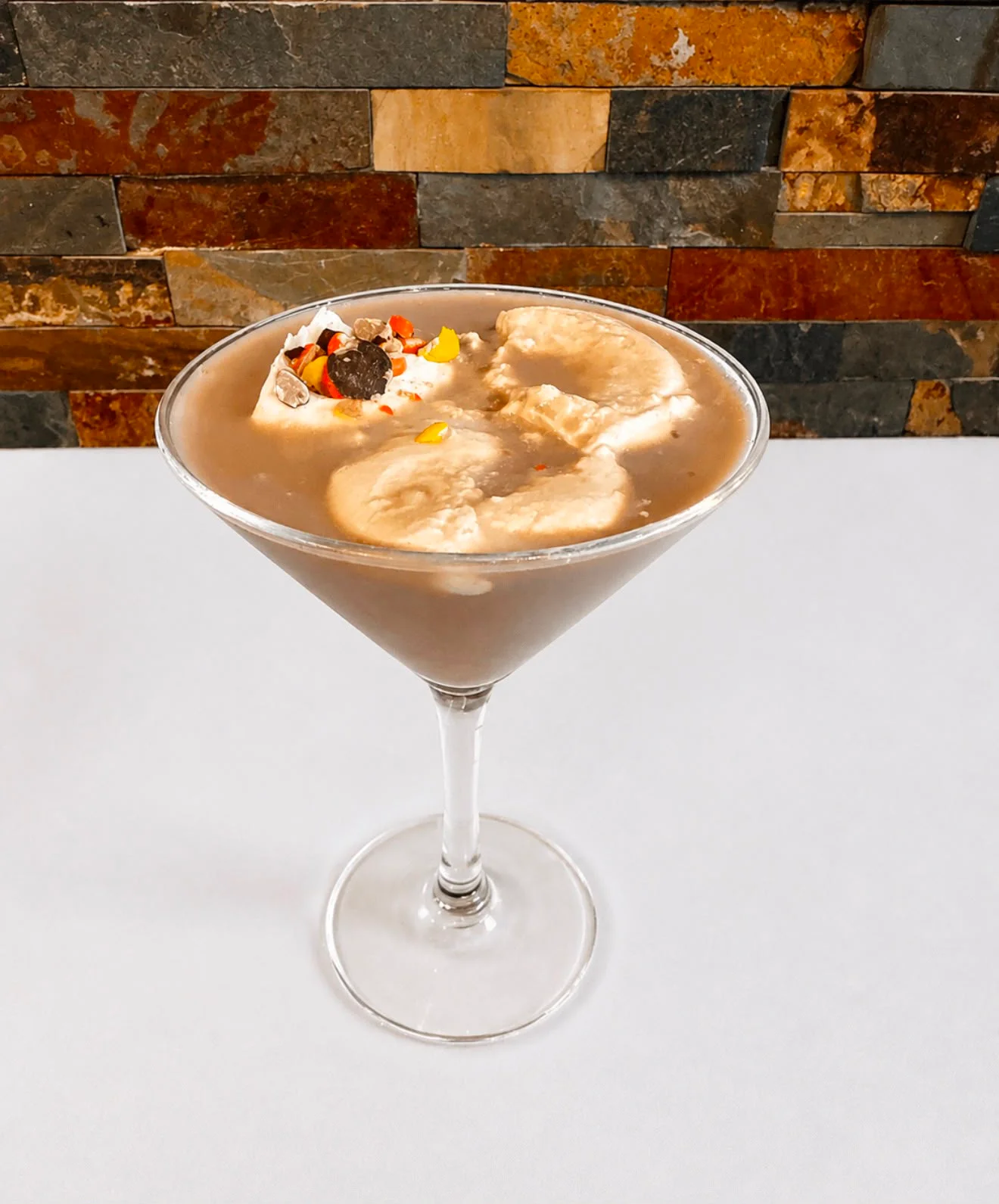 Decadent chocolate martini with ice cream and toppings