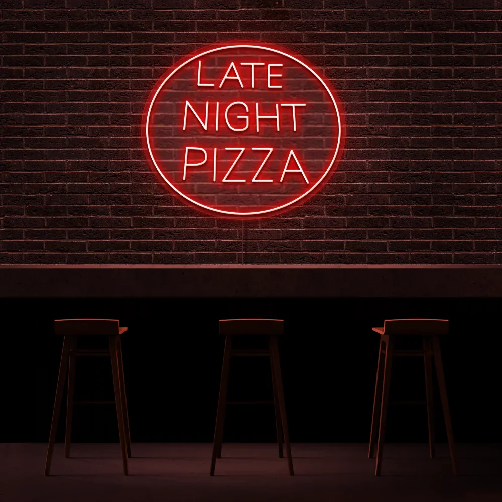 Cozy restaurant interior with neon 'Late Night Pizza' sign