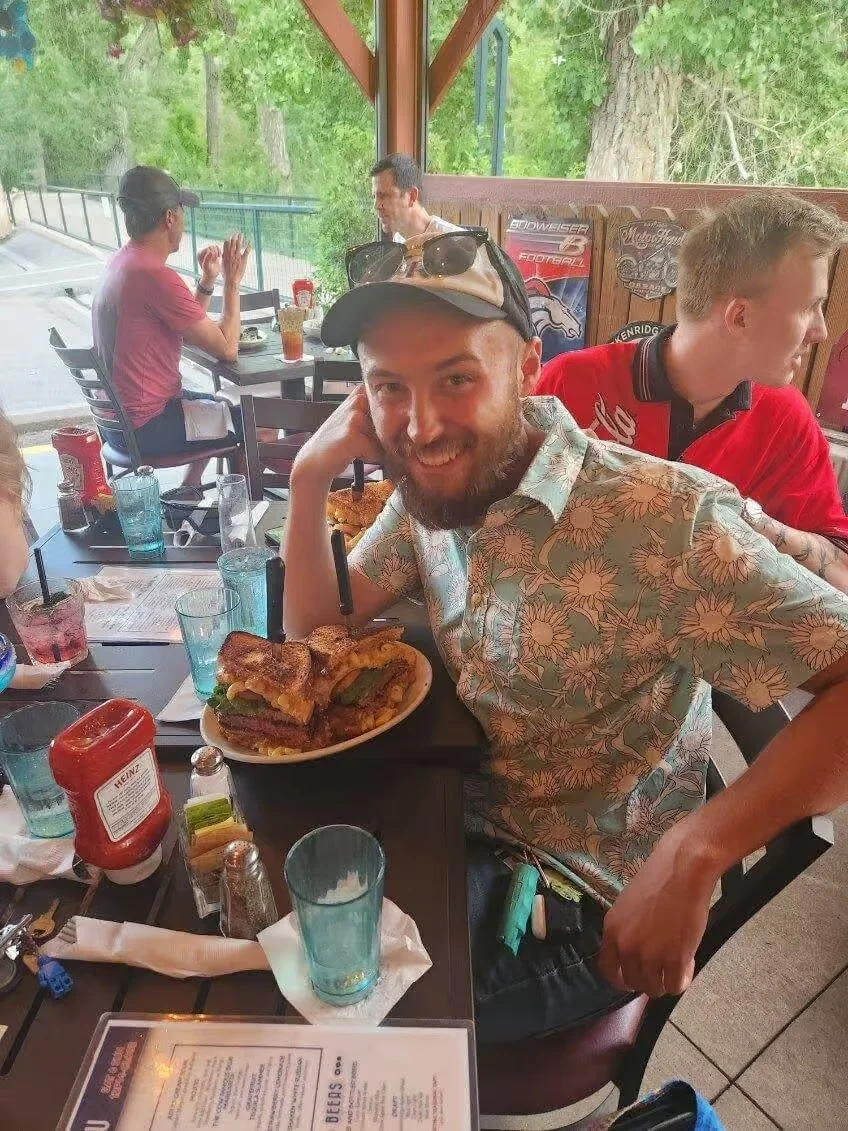 Giant cheeseburger platter in a casual dining setting