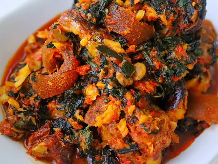 Nigerian egusi soup with leafy greens and spices
