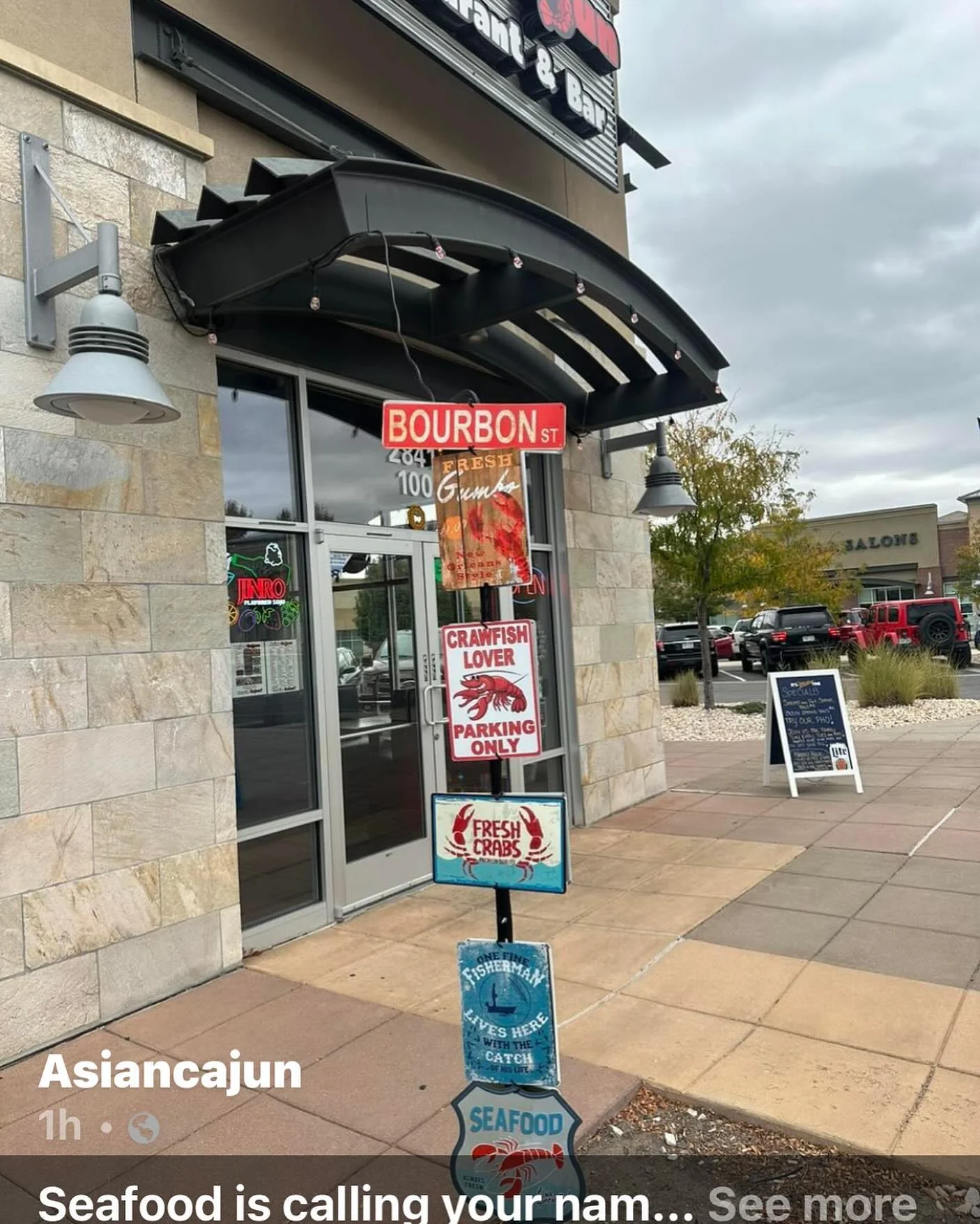 Restaurant exterior with seafood signage and Cajun theme