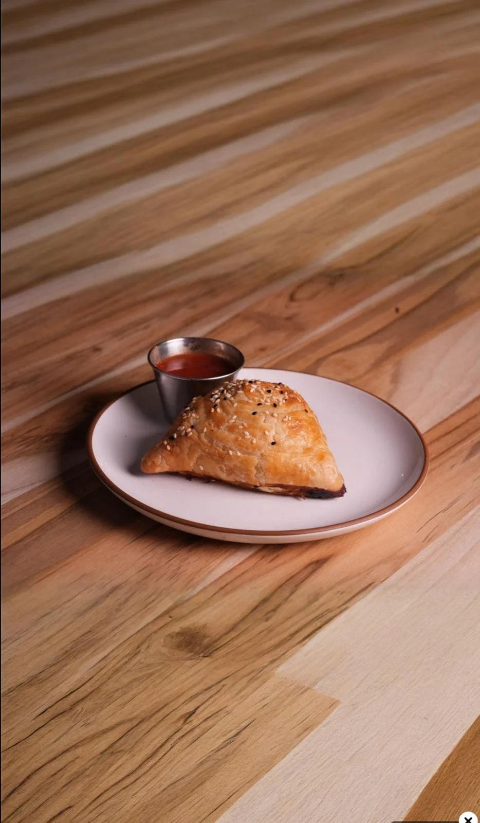 Authentic Uzbek Samsa with savory meat filling at Samarkand Nights Brooklyn