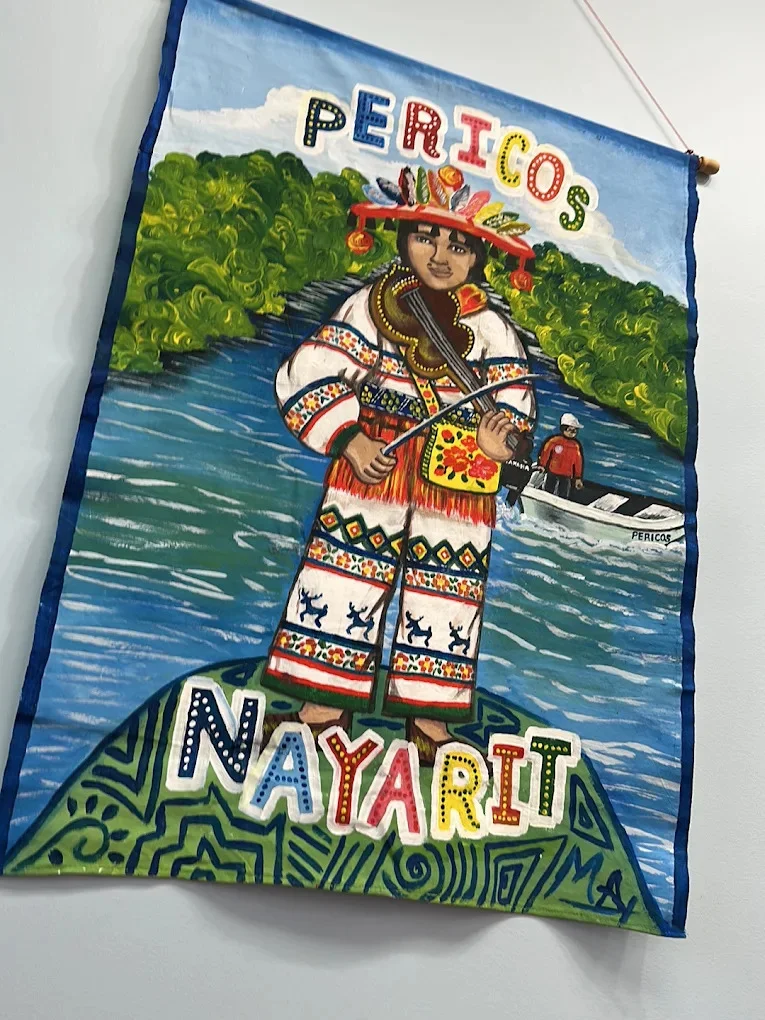 Colorful mural depicting a traditional Nayarit musician
