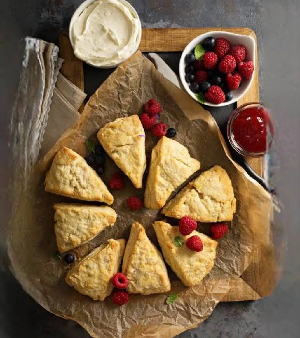 Scones with clotted cream and jam.