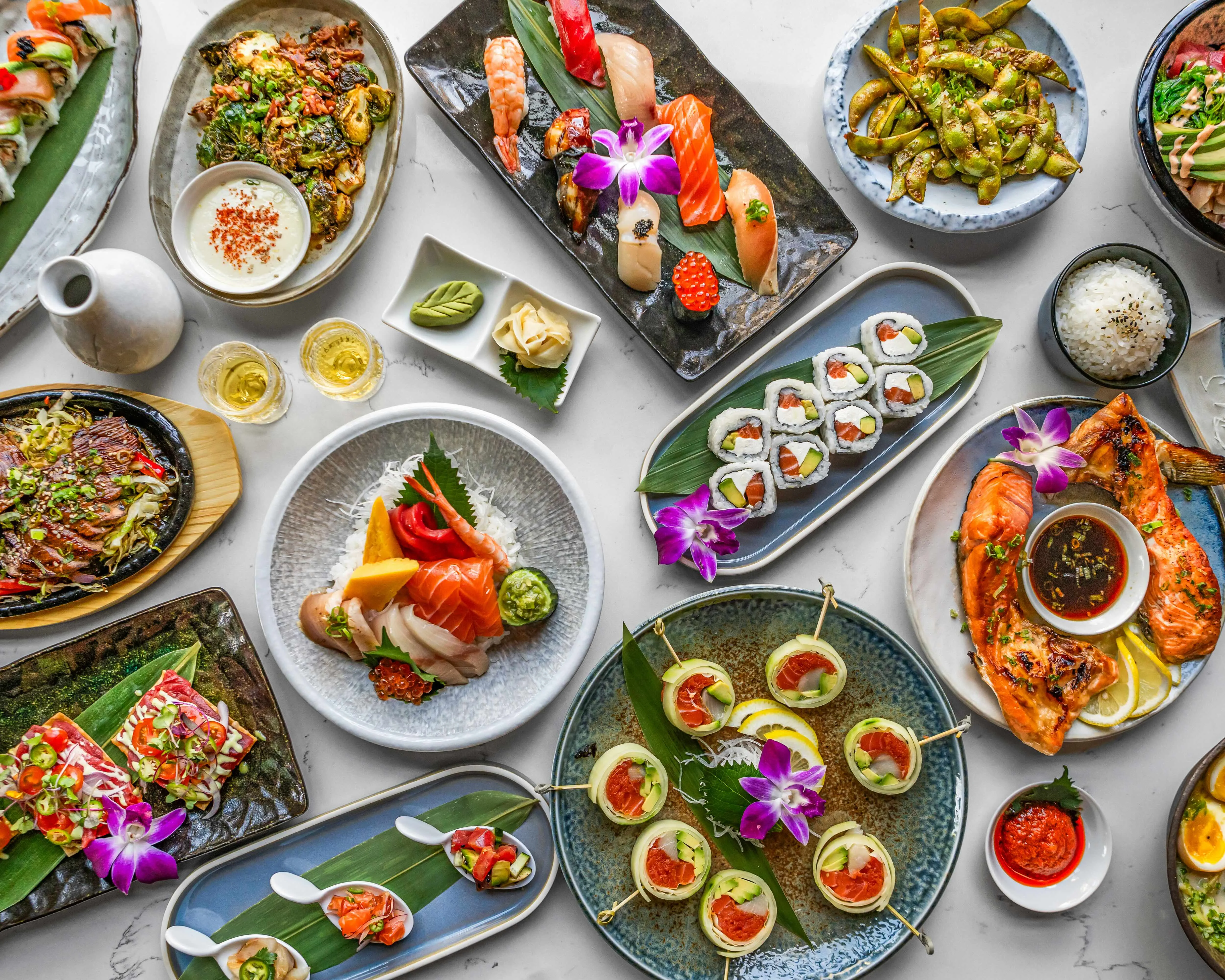 Assorted Japanese sushi and sashimi platter with vibrant garnishes