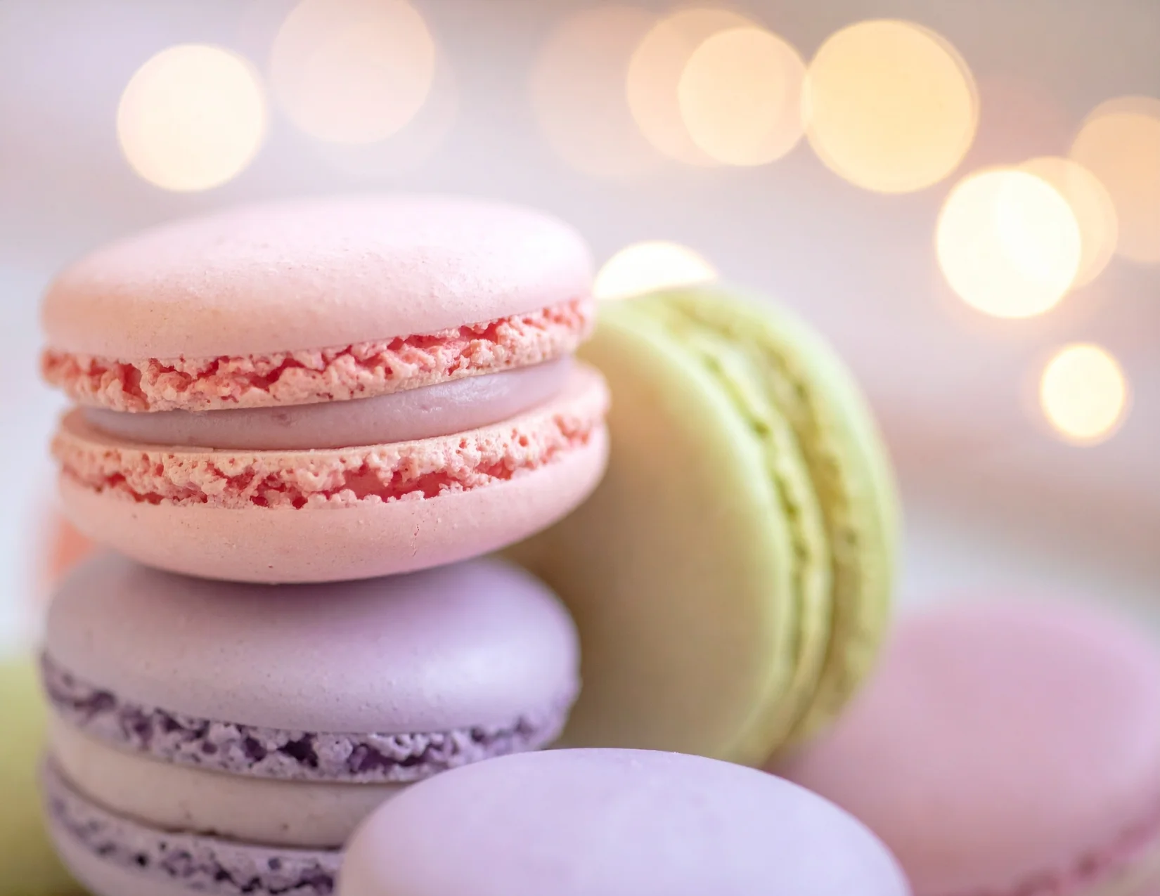 Colorful French macarons stacked elegantly