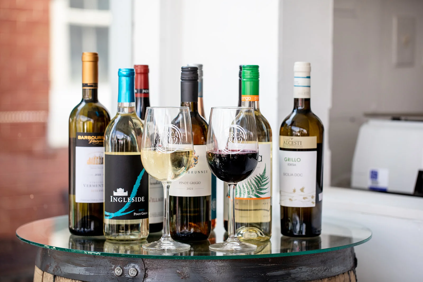 Selection of fine wines on a glass table