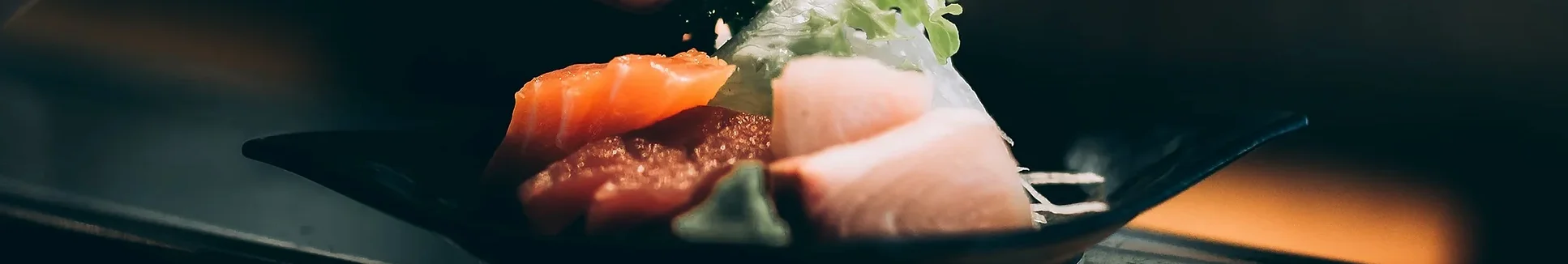 Assorted sashimi platter featuring fresh fish slices