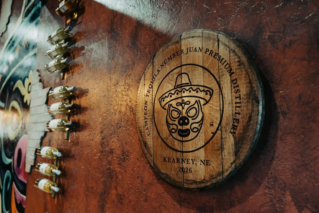 Wooden distillery sign for premium tequila in Kearney, NE