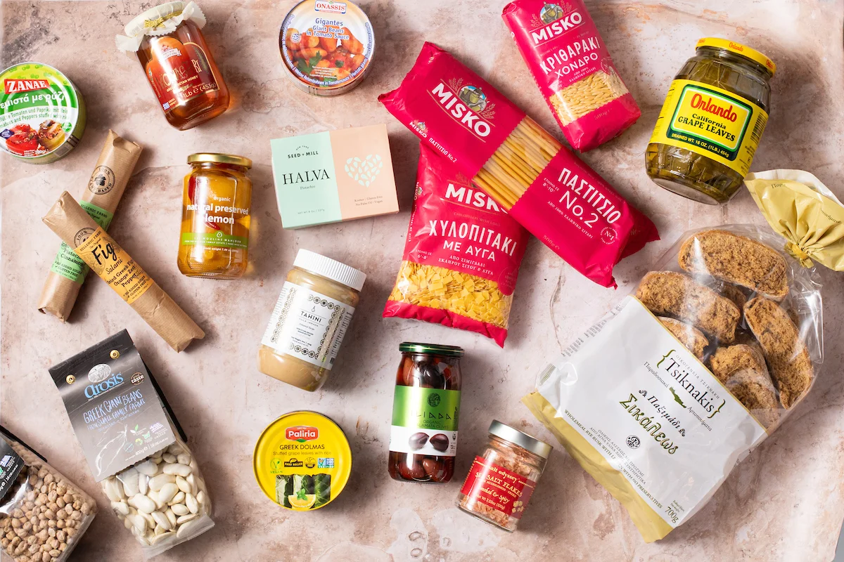 Mediterranean pantry essentials with pasta and preserved ingredients