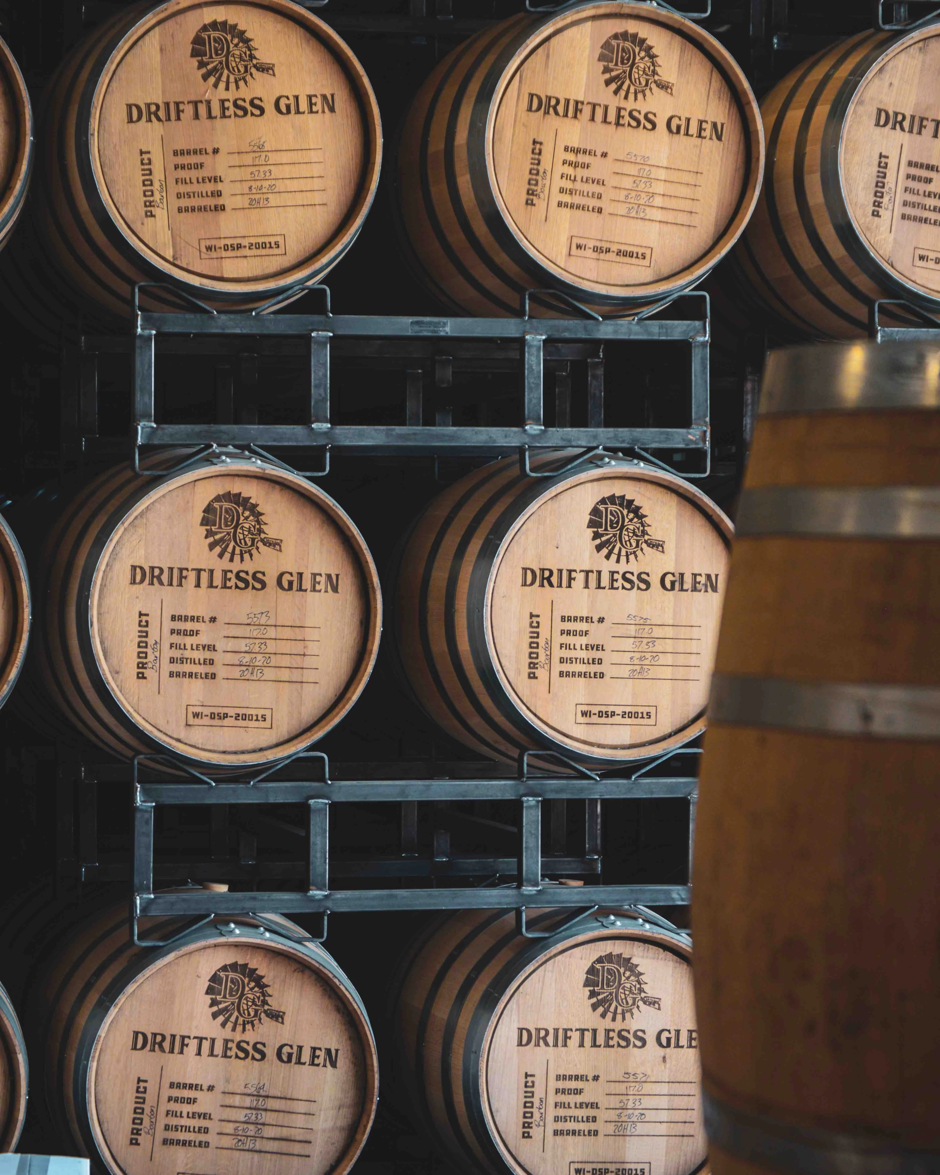 A close-up image of barrels in the rackhouse