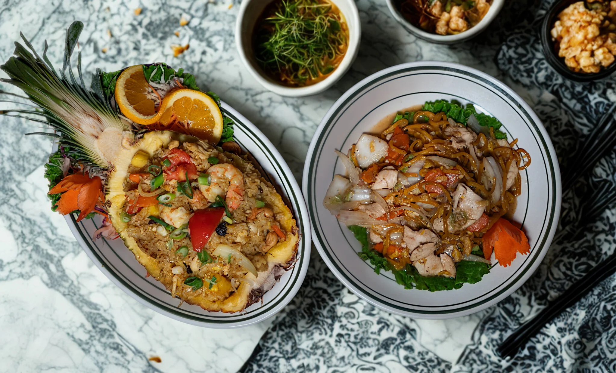 Pineapple fried rice served in a pineapple boat