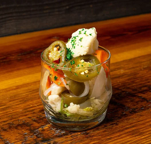 Mexican pickled vegetables in a glass jar