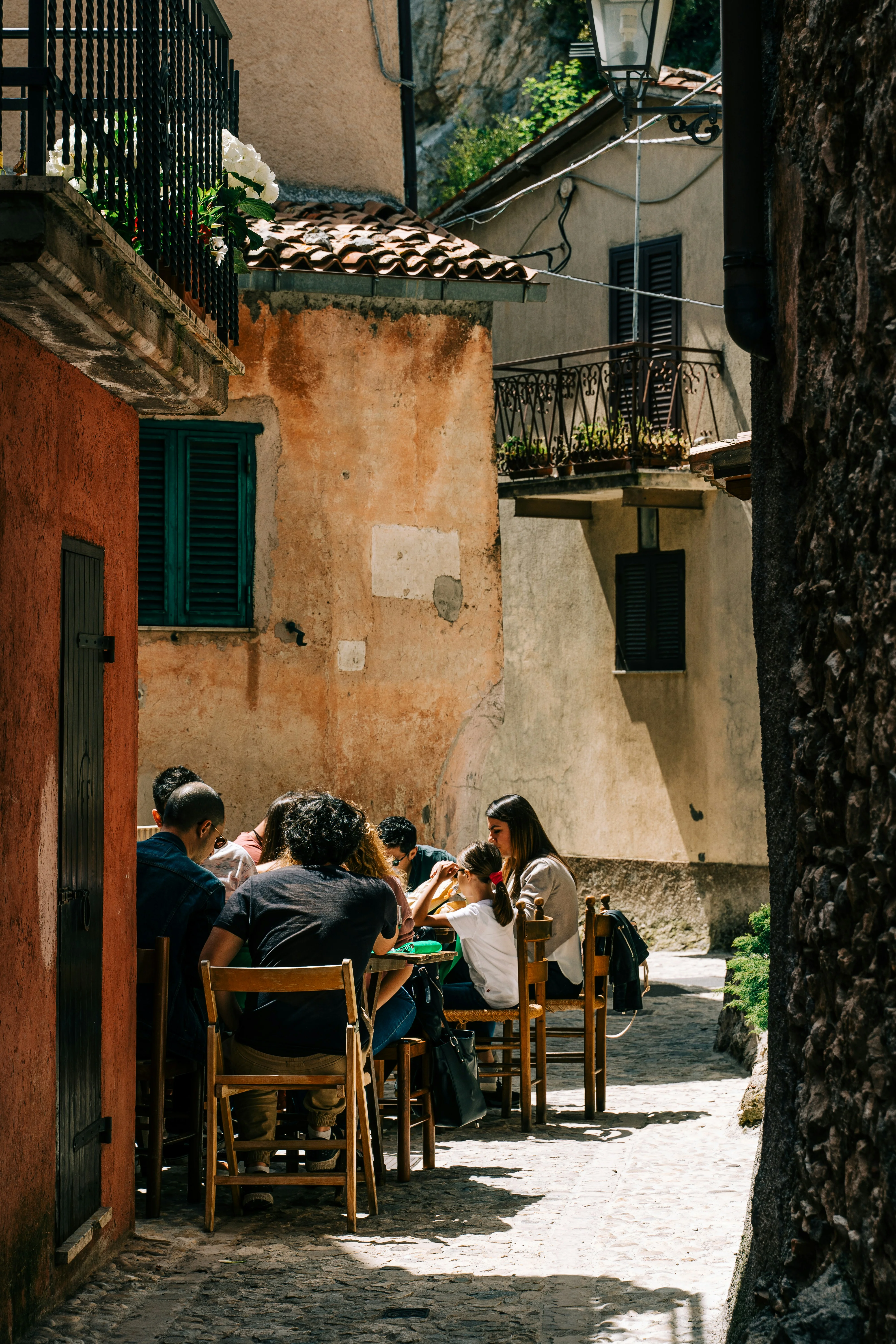 Gathering around a table with traditional Mediterranean dishes
