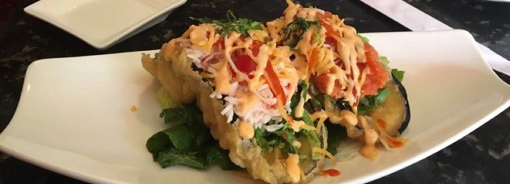 Crispy Japanese tempura sushi rolls with fresh toppings