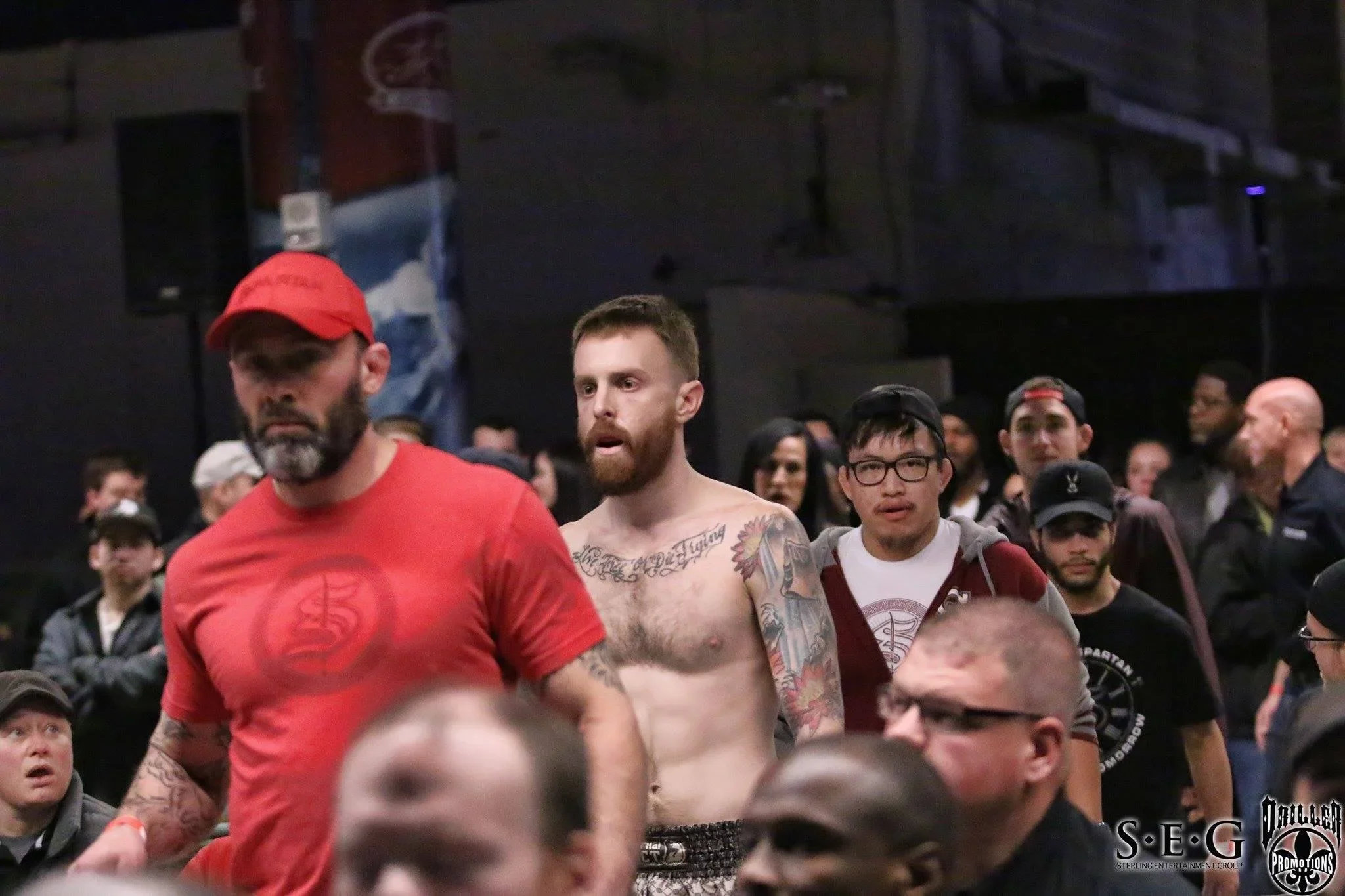 Fighters entering the arena for a mixed martial arts event