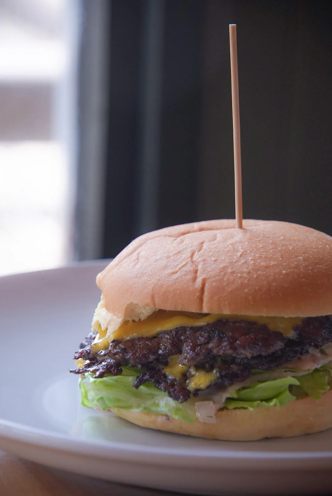 Juicy cheeseburger with melted cheese and a soft bun