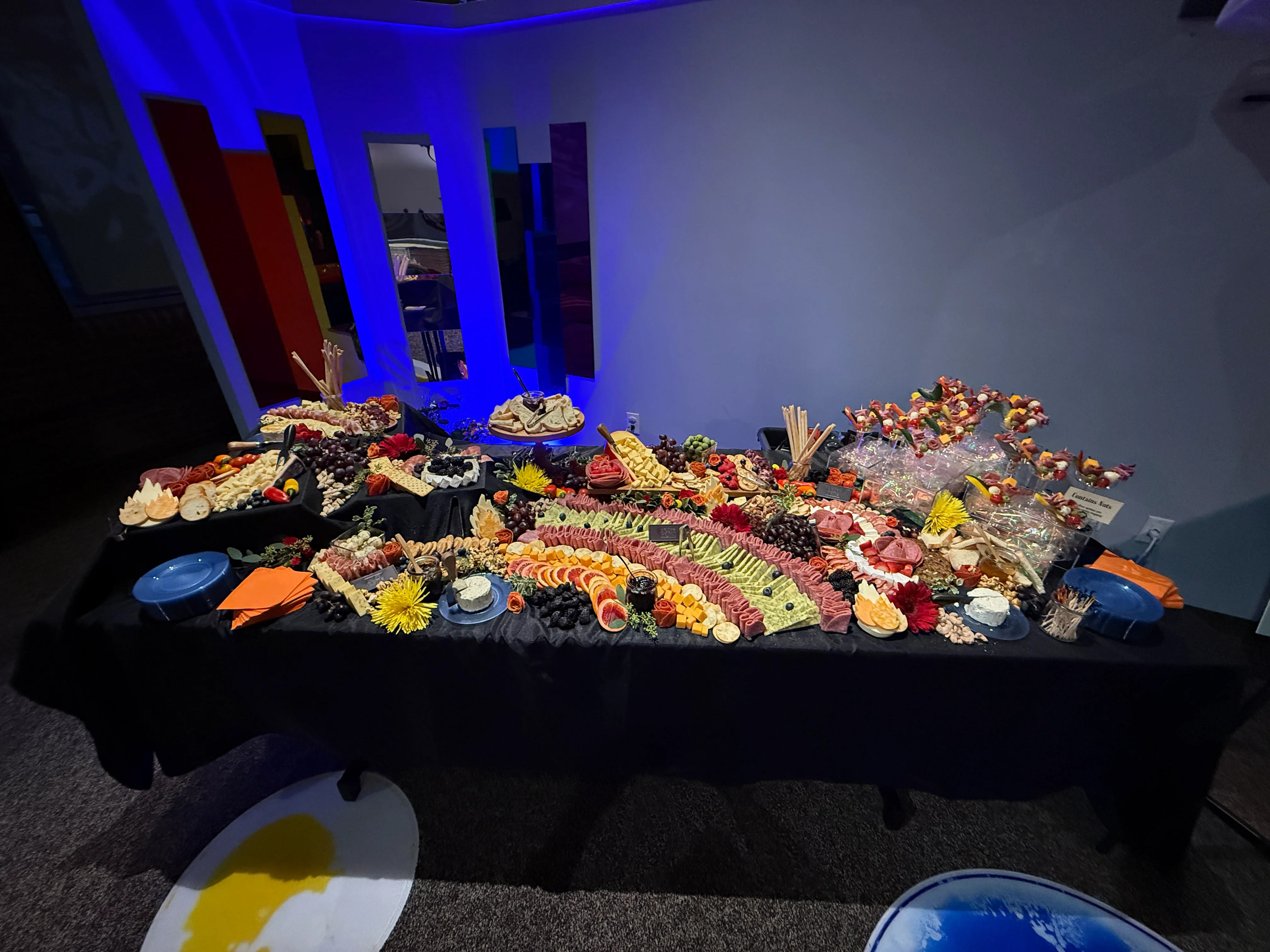 Elegant charcuterie and fruit display at an event