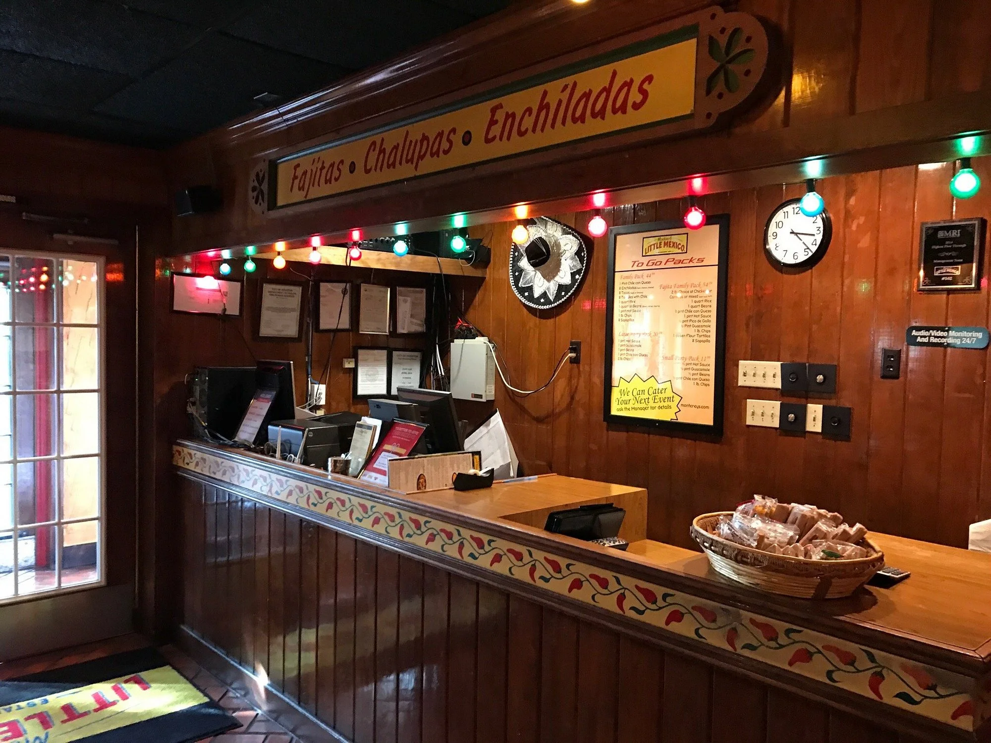Cozy restaurant interior with colorful lights and wooden decor