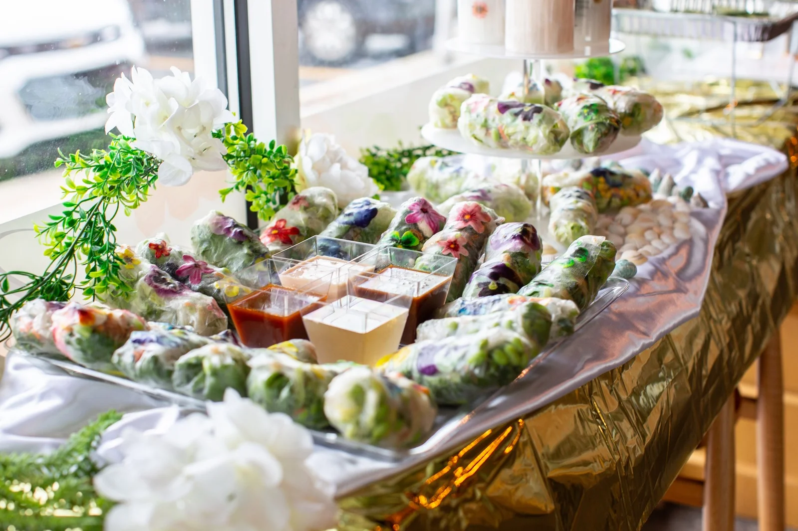 Colorful Vietnamese spring rolls with dipping sauces