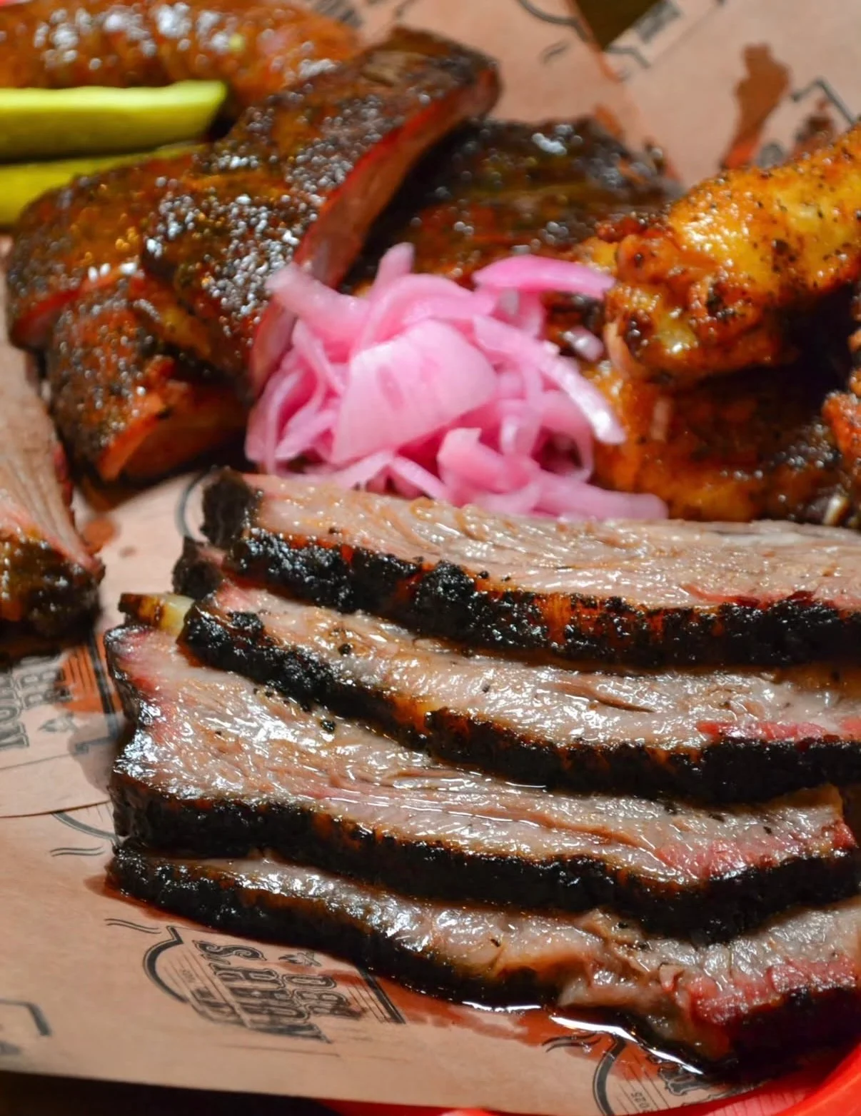 Smoked Texas brisket platter with pickled onions
