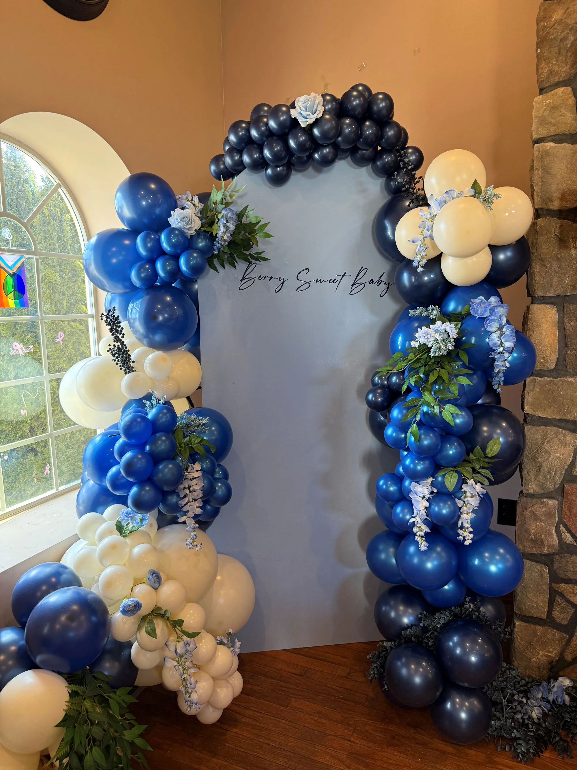 Elegant balloon arch for a baby shower celebration