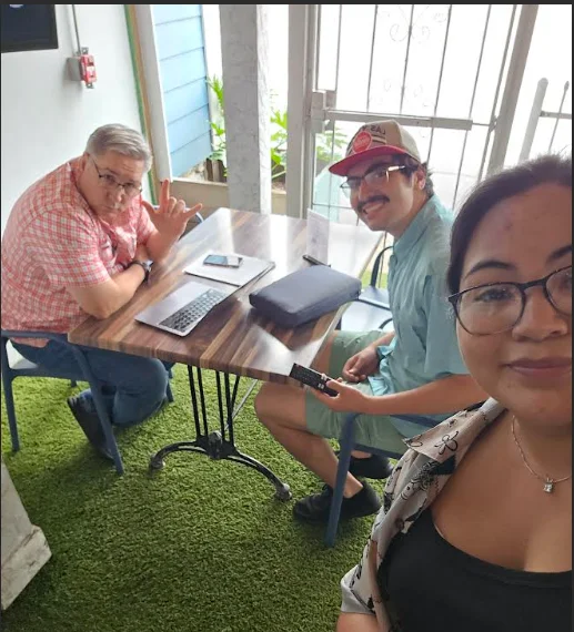 Casual dining space with friends at a table
