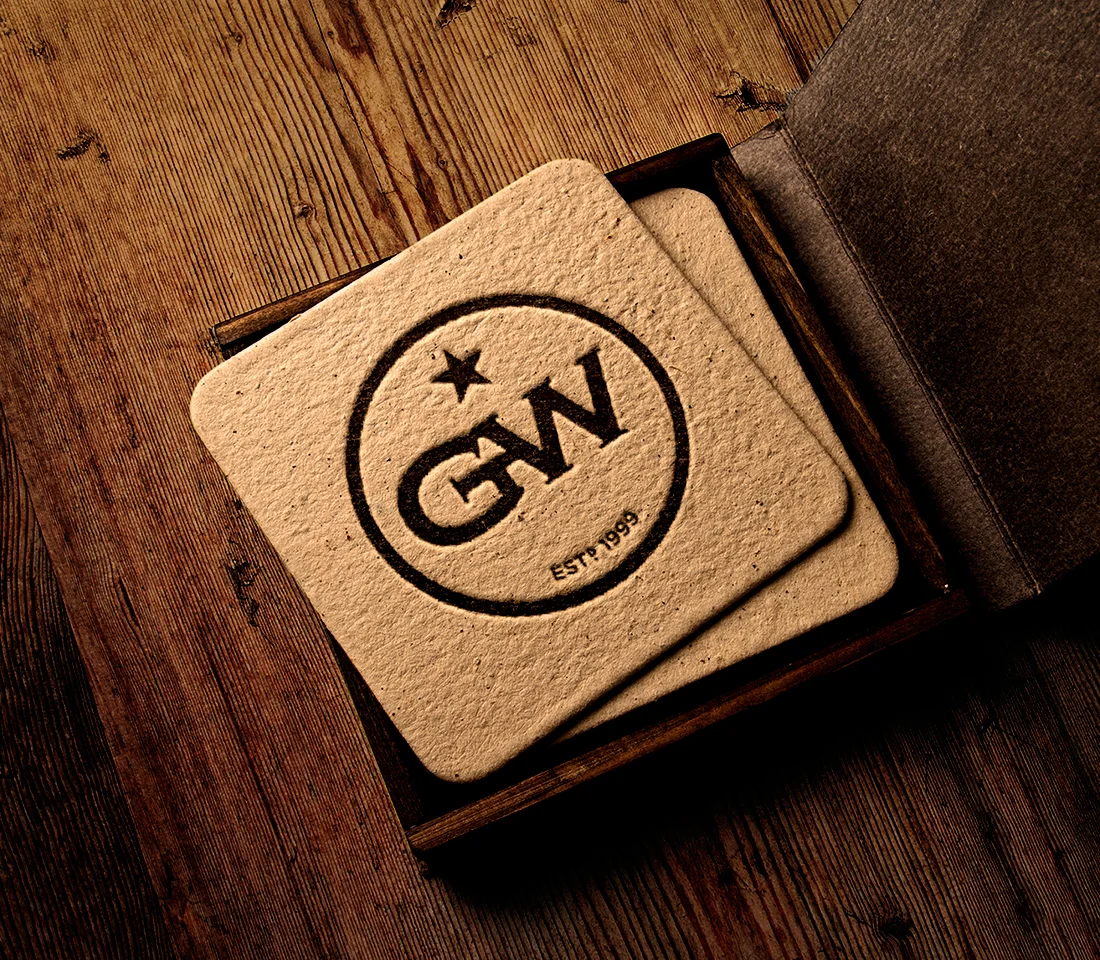 Coaster with logo in a rustic wooden box