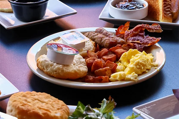 A vibrant brunch buffet featuring a variety of dishes and fresh ingredients.