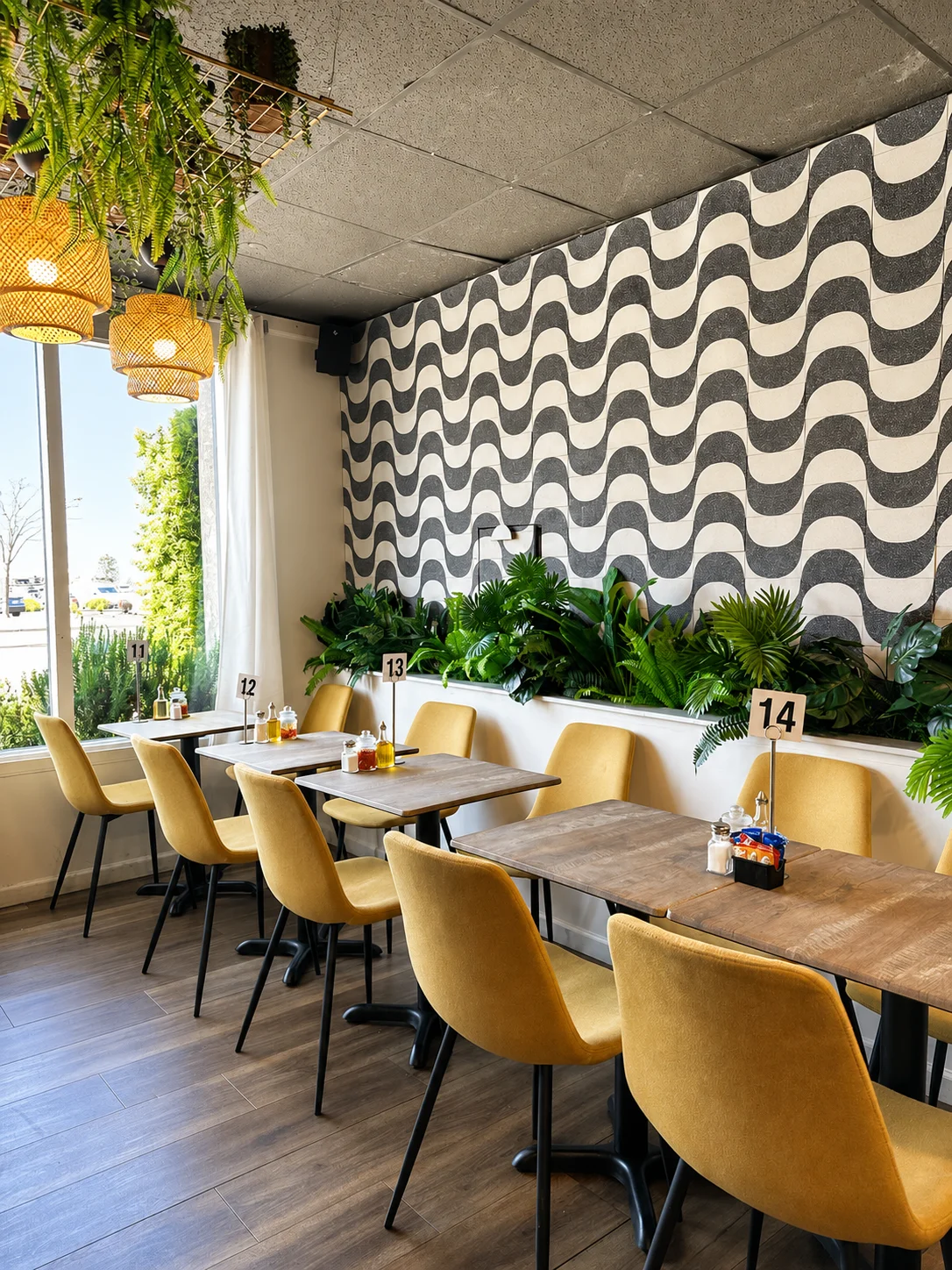 Cozy restaurant interior with modern decor and greenery