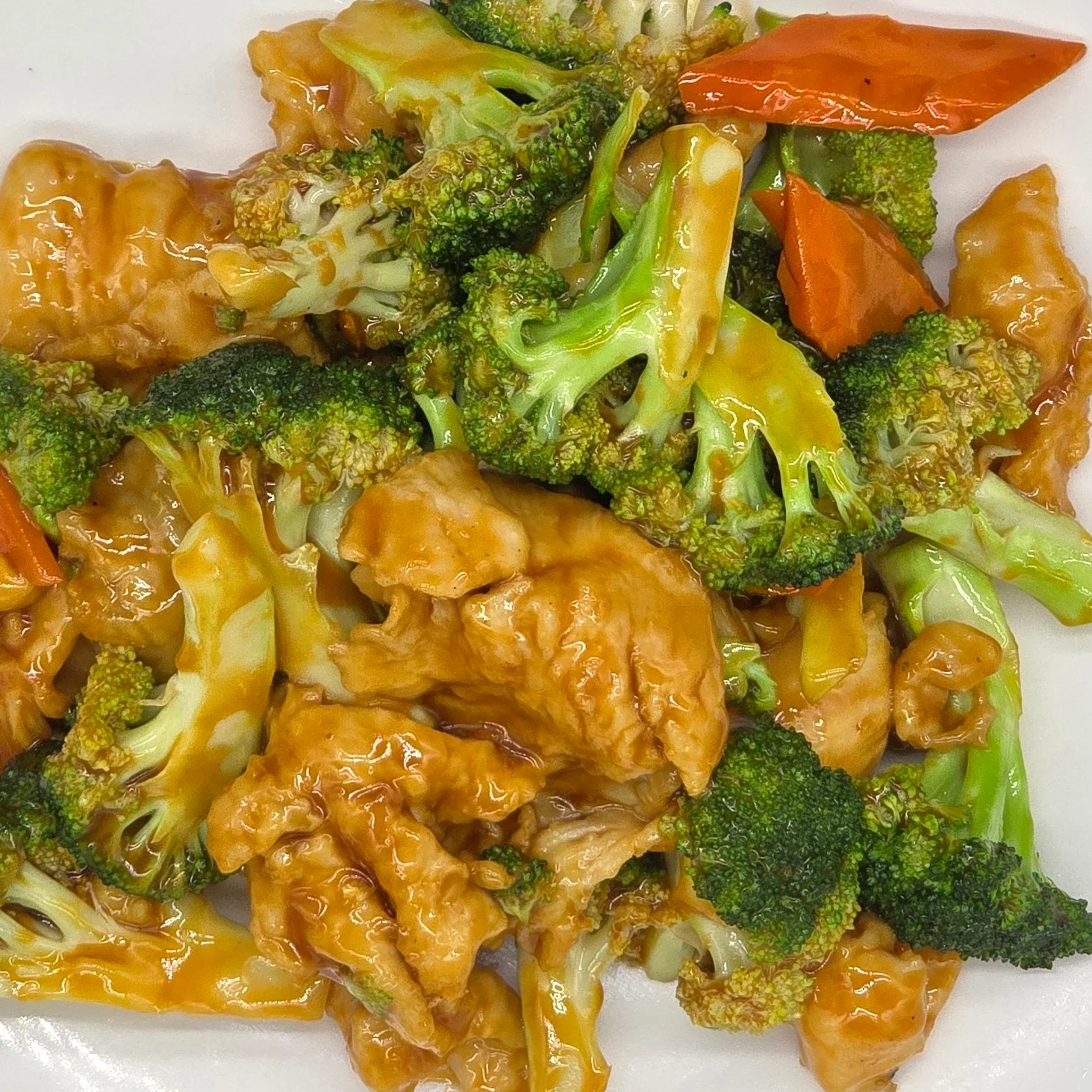 Chinese chicken and broccoli stir-fry with chili peppers