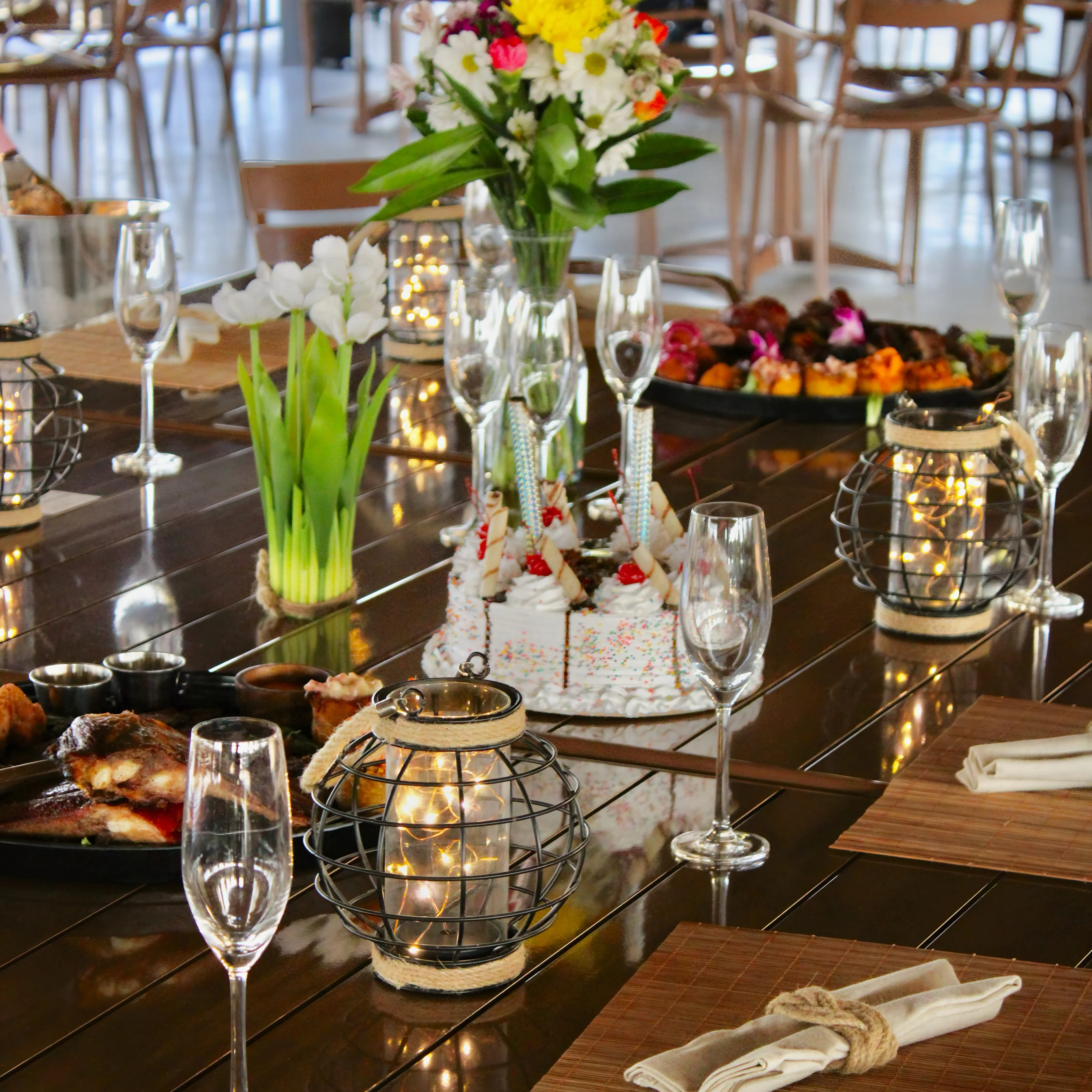 Elegant restaurant table setting with floral centerpiece and gourmet dishes