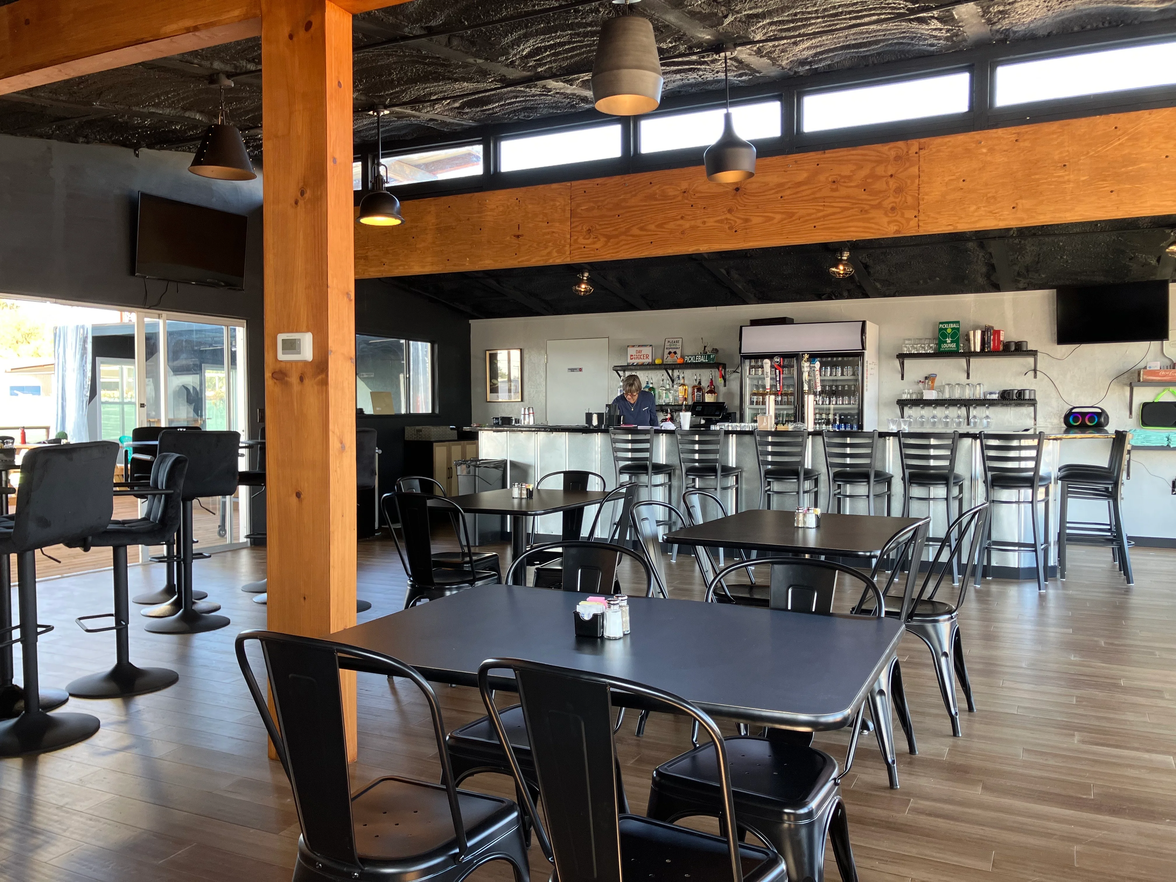 Modern restaurant interior with bar and seating