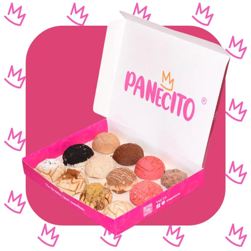 Colorful assortment of Mexican conchas in a pink box