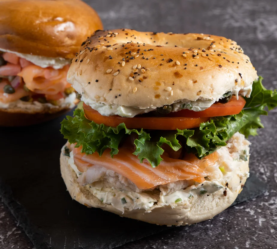 Nova and whitefish salad sandwich on a poppy seed bagel