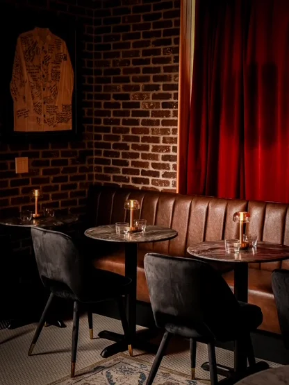 Cozy restaurant interior with brick walls and warm lighting