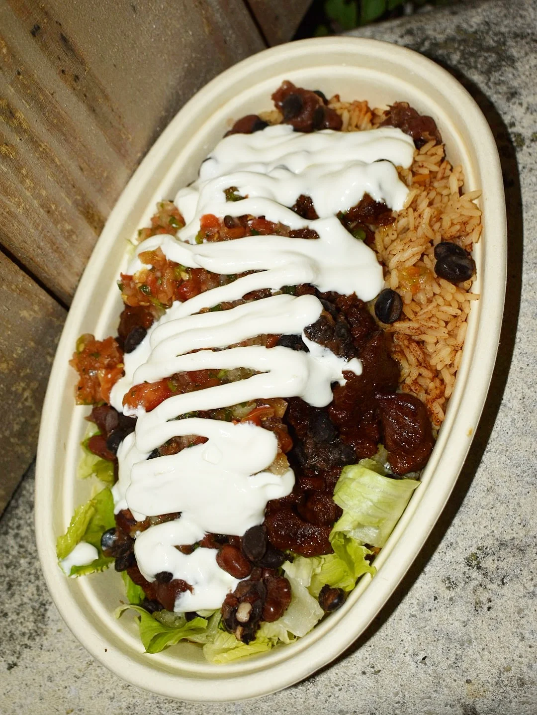 Bowl of Mexican burrito bowl with rice and beans