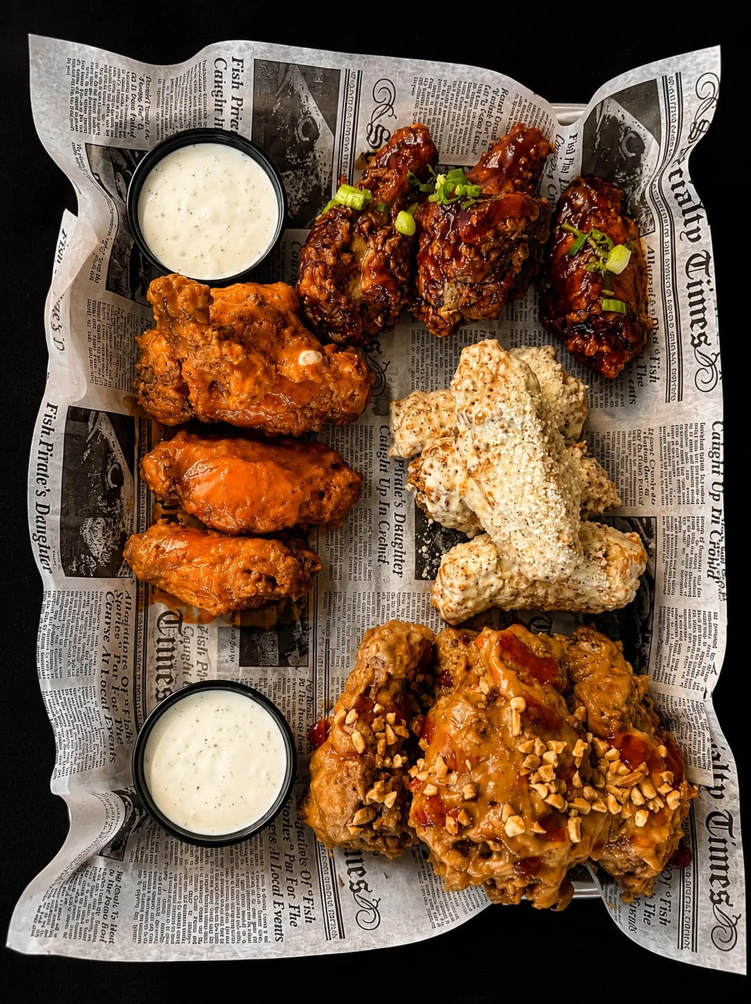 Assorted chicken wings platter with dipping sauce